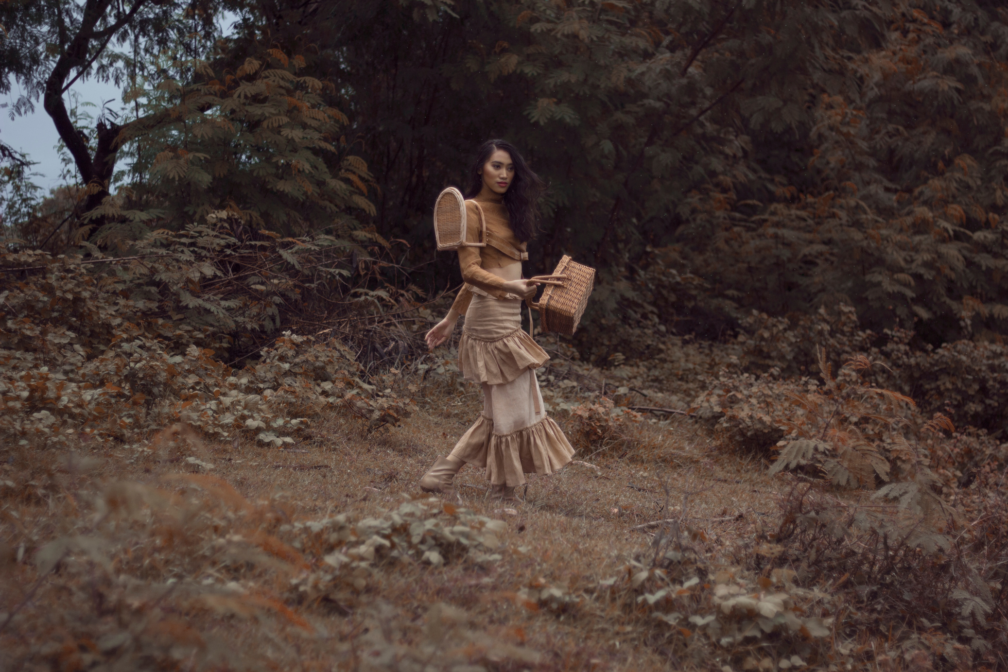 Woman Holding a Wicker Basket