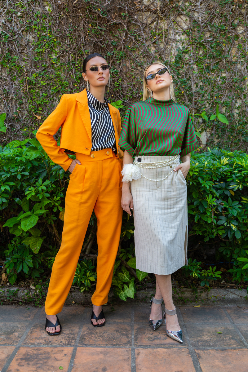 Women in Stylish Outfit Posing